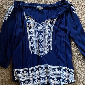 Cute shirt, fits lose. Sleeves go to the elbow